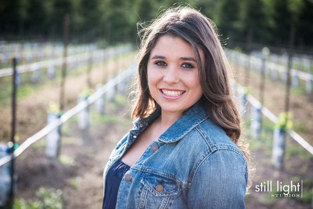 High school senior portrait photographed by Still Light Studios